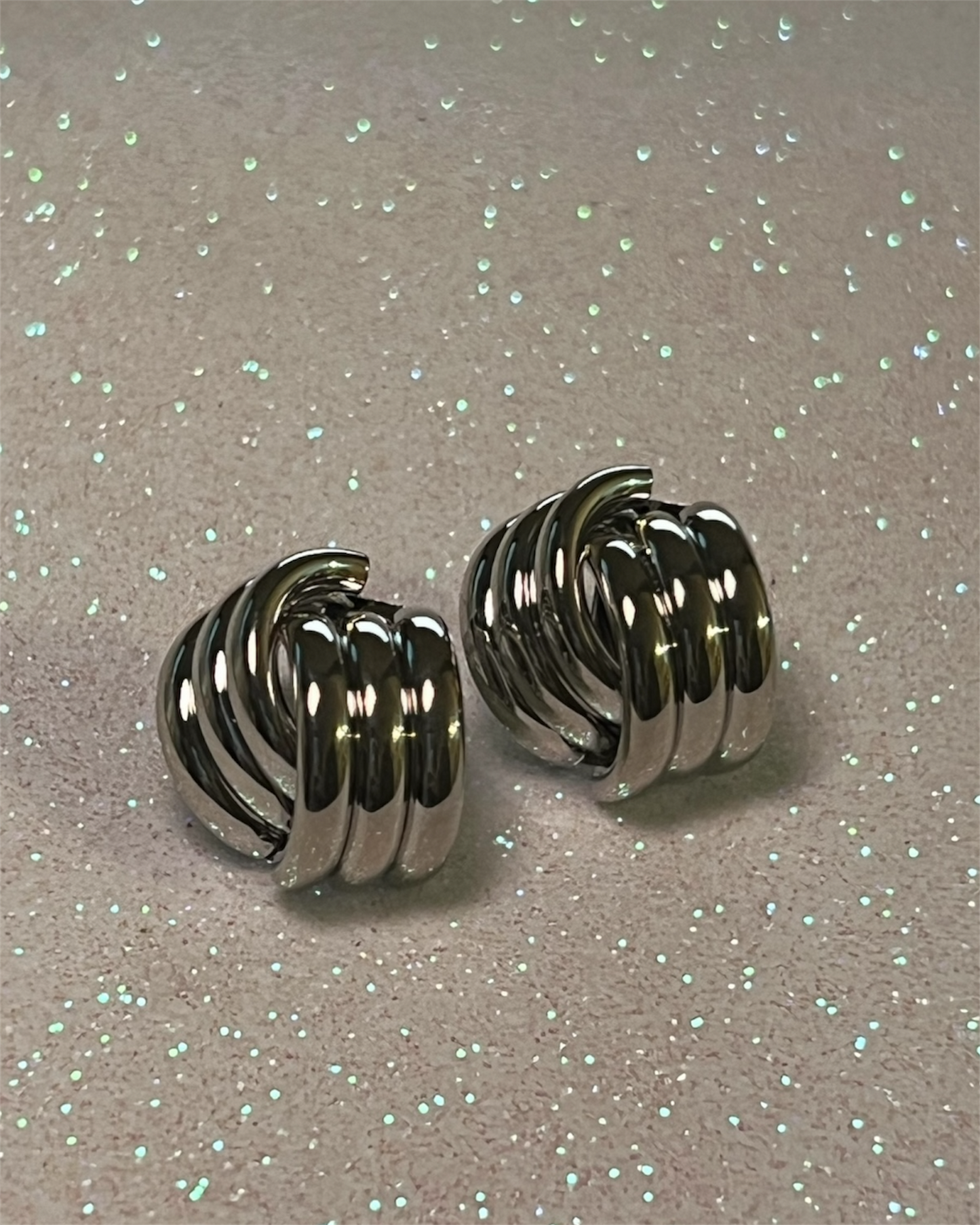 B156- aretes plateados